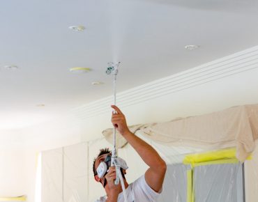 interior painting london team during painting in retro-styled house
