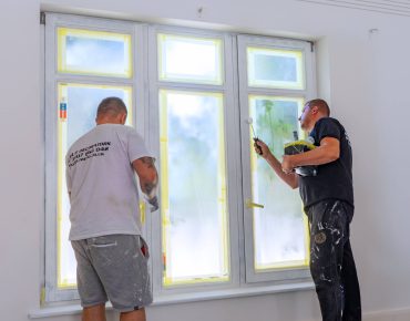 interior decorator london during painting windows on white colour